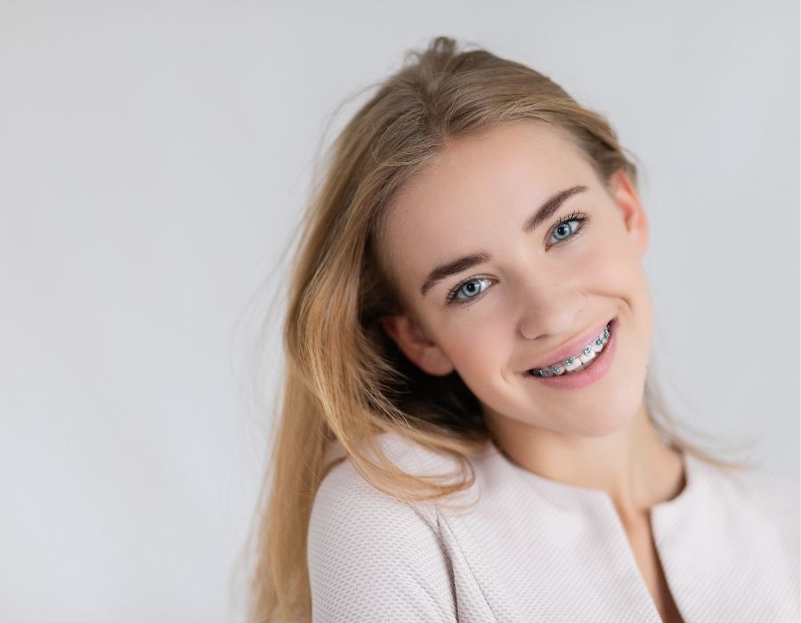 beautiful girl smiling with braces