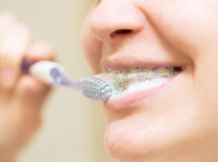 brushing teeth with braces on